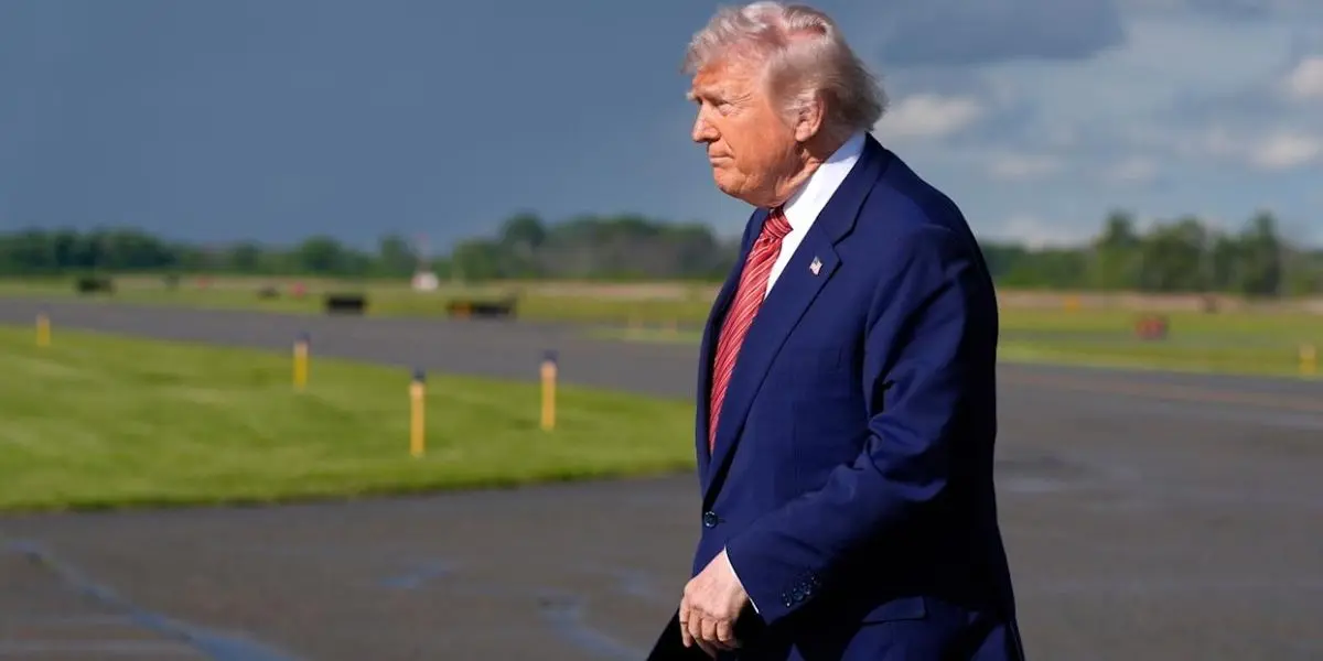 President Donald Trump arrives on Air Force One at Morristown Municipal Airport in Morristown, N.J., Friday, May 23, 2025. (AP Photo/Manuel Balce Ceneta)